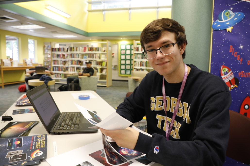 Teen volunteering at the library