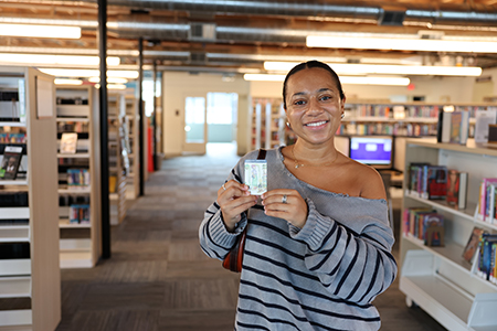 Library cardholder with new library card