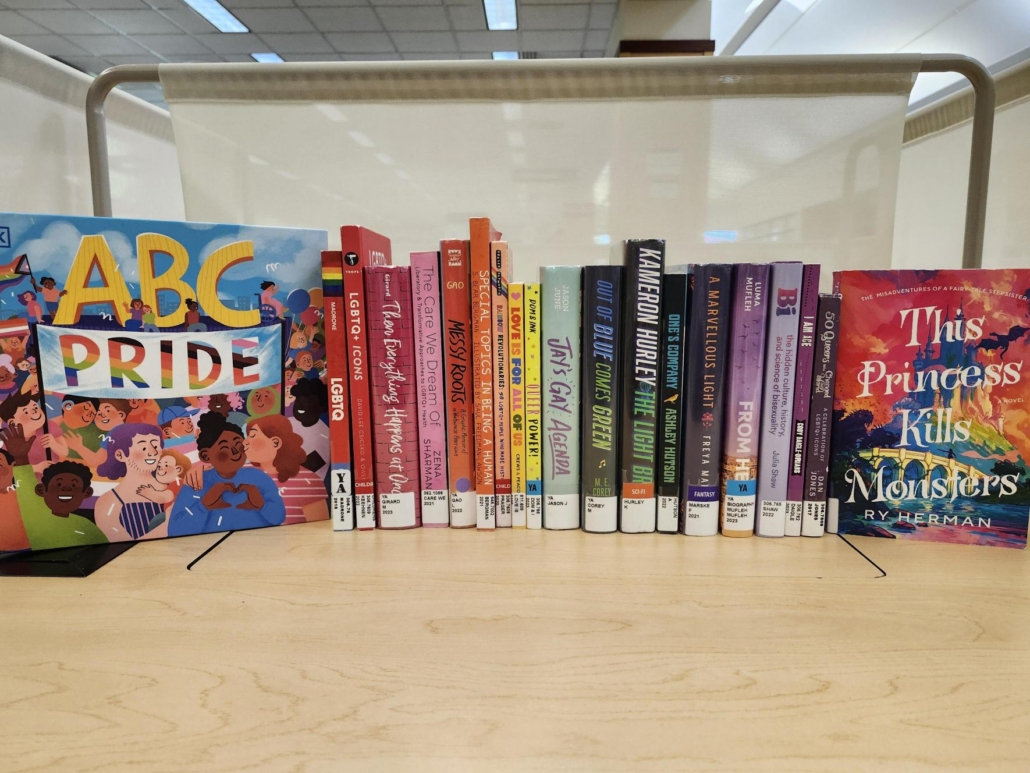 Collection of books by 2SLGBTQIA+ authors and containing Pride Stories and Voices